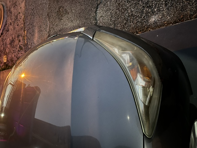 Hood after repair, viewed from the front corner
